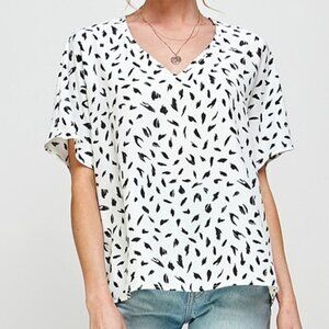 NWOT. Aluvina Relaxed Top
